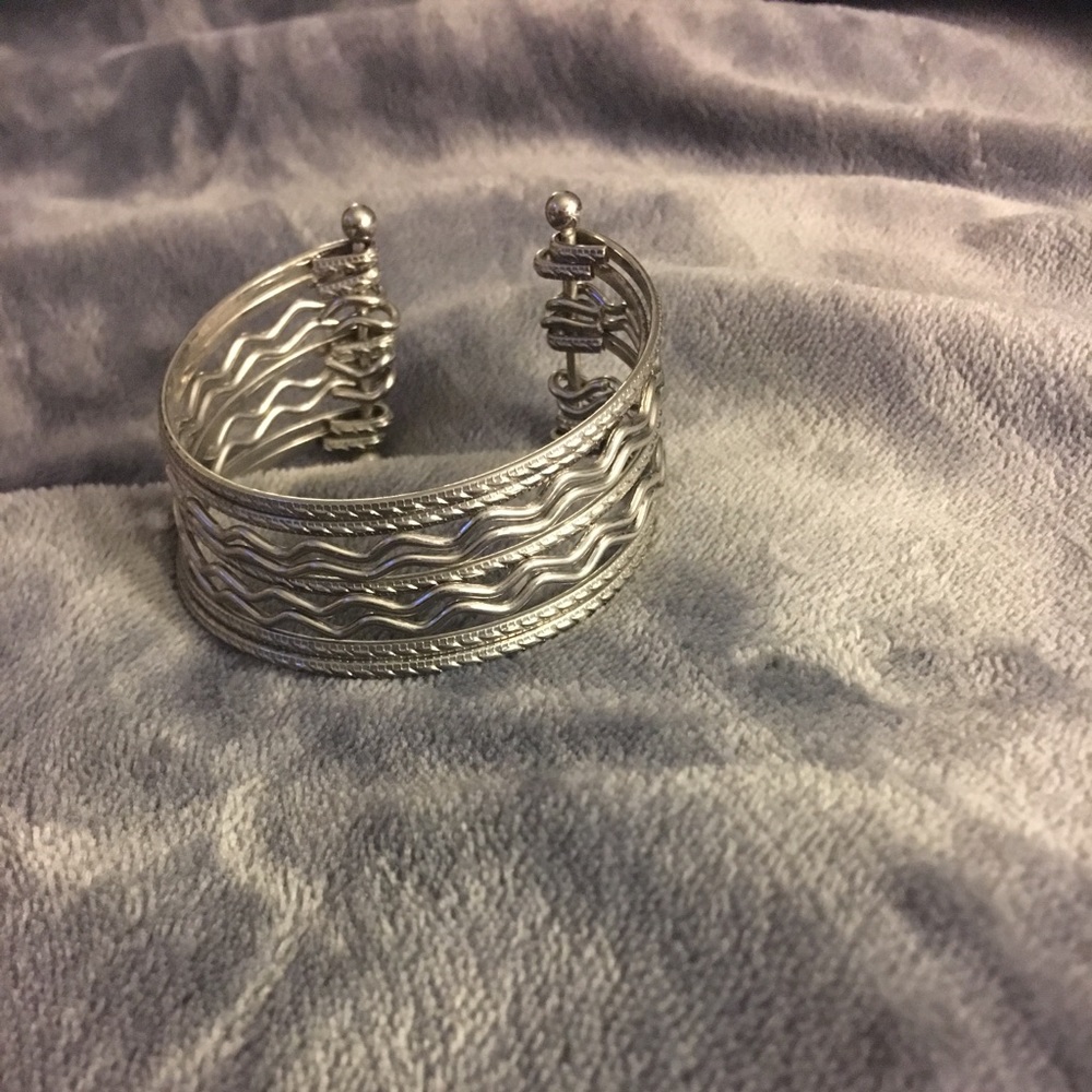 Attached metal bracelets